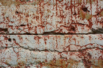 Texture of bloody damaged stone wall