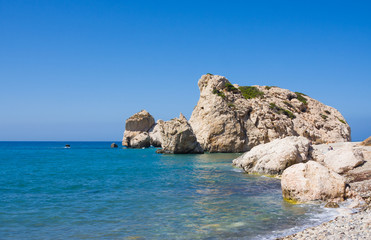 Fototapeta na wymiar Love beach. Aphrodite's Rock - Aphrodite's birthplace near Paphos City. The rock of the Greek (Petra tou Romiou). Cyprus island