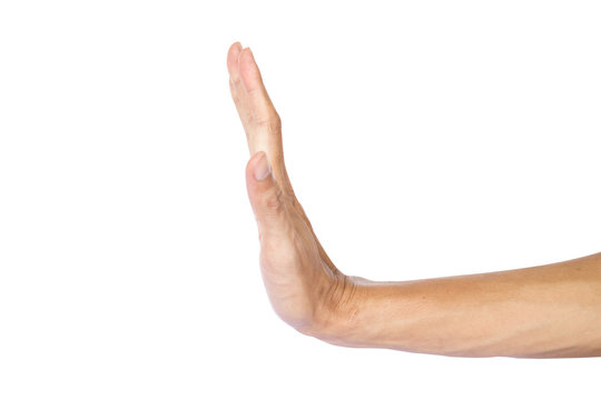 Man making stop gesture with hand isolated on white background with clipping path.