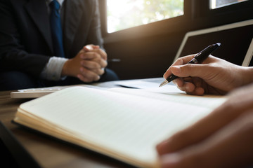 exectives partnership analysis on data paper working with investment data or company growth valuation, selective focus