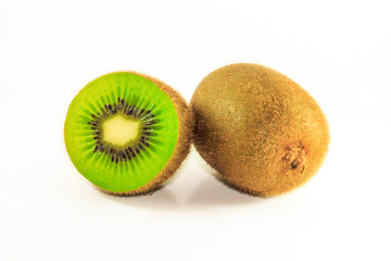 Ripe kiwi fruit and half kiwi fruit on white background.