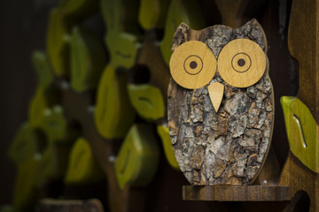 Toy owl made of wood. Beautiful image