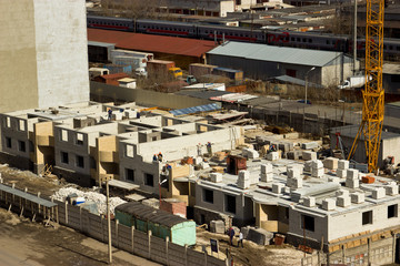 Fototapeta premium Construction of a multi-storey building in Ulyanovsk.