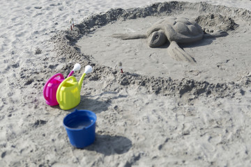 Fototapeta na wymiar Sand sculptures from the beach