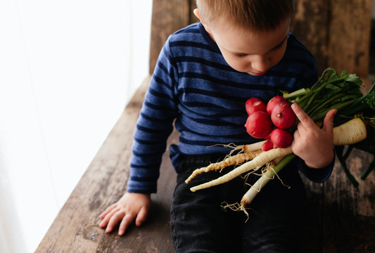 Boy and vegetable