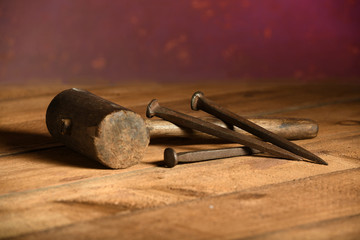 Naklejka premium Mallet and Three Metal Spikes