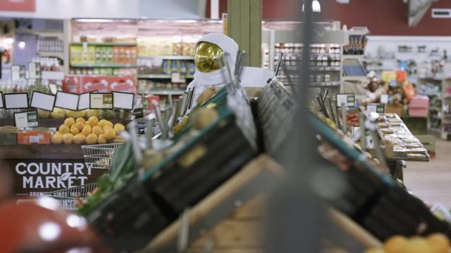  Off duty astronaut doing his grocery shopping at the supermarket