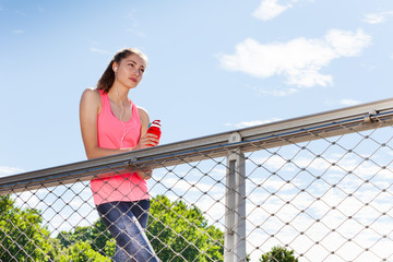 Young woman resting after running training outdoor