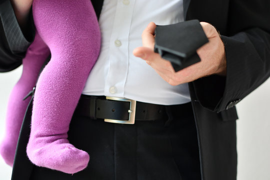 Gesch&auml;ftsmann mit Kind