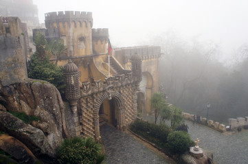 Entrance to Da Pena palace in the mysterious fog, Sintra, Portugal