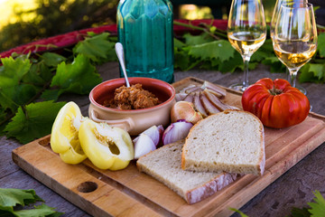 Rustic outdoor picnic setting at winery