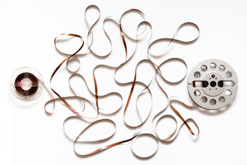 Two reels and tape on white