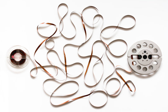 Two reels and tape on white
