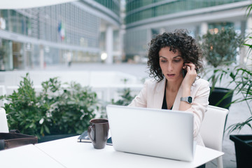 Businesswoman working with laptop Working on Laptop Computer