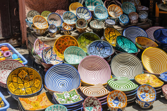 Handmade ceramic plates and bowls for sale in the Souks, Marrakech, Morocco