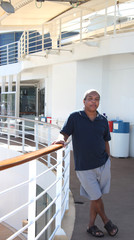 African american male relaxing on a cruise ship travel vacation outdoors on deck.