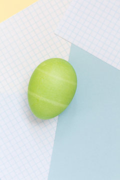 Pastel easter eggs on colorful background