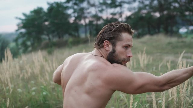 Modern cossack workouts with swords in the fields 4K