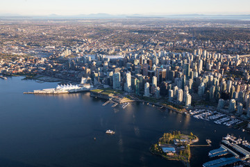 Naklejka premium Beautiful Aerial View of Vancouver Downtown, British Columbia, Canada, during a bright spring sunset.