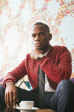 Indoor Portrait of Handsome Young Black Man in Bright Living Room
