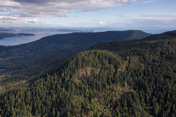 Fototapeta premium Bowen Island, with Vancouver City in the Background. Picture taken from an Aerial Perspective in British Columbia, Canada.