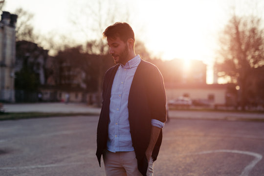Pensive man portrait at sunset