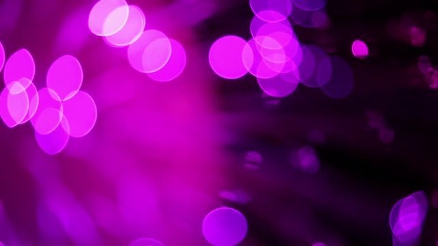 Multicolored lights with bokeh, defocused motion abstract background