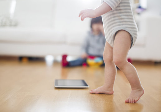 1 year old boy make his first step