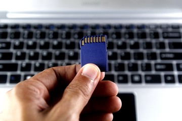SD card and a laptop computer
