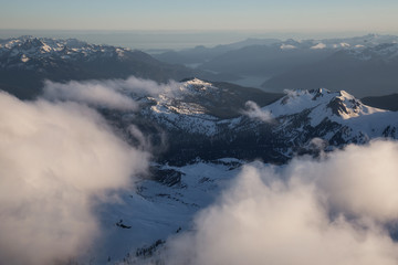 Aerial view of the Mountains near Squamish, North of Vancouver, British Columbia, Canada. Taken during a sunny summer day.