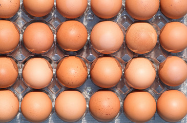  Lots of brown fresh chicken eggs. Top view