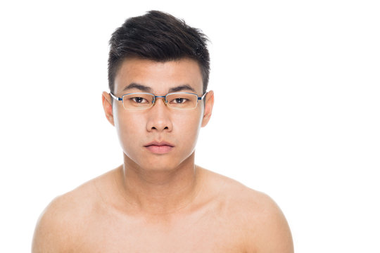 Handsome man face with glasses  close up portrait studio on white background