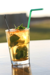 Close-up of a mojito cocktail in a transparent glass