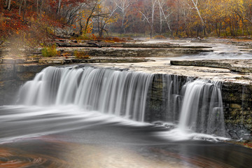 Fototapeta na wymiar Misty Morning Waterfall - Lower Cataract Falls in Autumn, Indiana