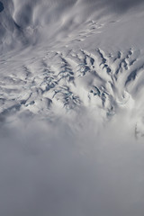 Aerial view of the beautiful and rugged mountain terrain. Taken far remote Northwest from Vancouver, British Columbia, Canada.