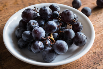 Concord Grapes in a Bowl