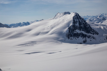 Aerial landscape view of the mountains. Taken far remote North West from Vancouver, British Columbia, Canada.