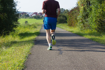 outdoor exercise running man in september