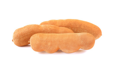 Dried tamarind fruits isolated on a white background