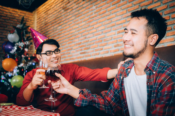 Asians people are together to celebrate the Christmas and Happy New Year party.