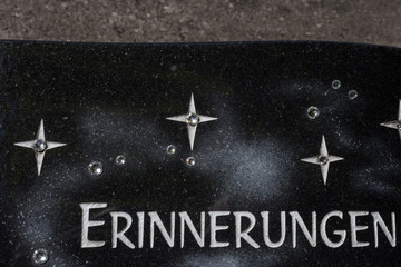 cemetery memory keepsake decoration beside tomb