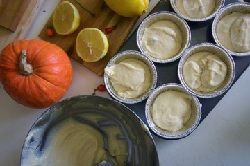 The process of making lemon muffins in baking forms. Cooking process.