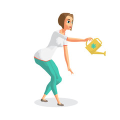 Young woman housewife is watering the indoor flowers. Girl with 