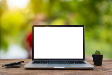 Computer Laptop and tablet computer  on the table blur background with bokeh, business technology concept