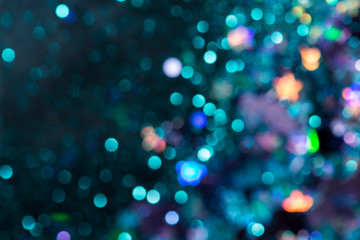 Fototapeta na wymiar Colorful glitter abstract background with bokeh