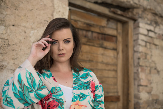 cute young woman looking straight in camera