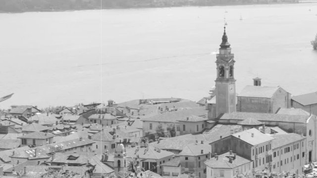  Overview of Arona town on Maggiore Lake, Italy. retro footage