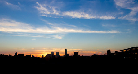 big city skyline at sunset