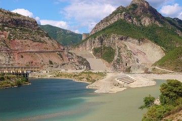 Mountain landscape in North Albania with river Koman and a huge dam, in the remote village Koman. Southeast Europe.
