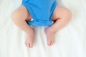 Feet of newborn baby with copyspace